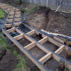 An image of a walkway being made using timber subframe and Walther Strong Decktape Pro.
