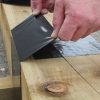 Square Post being wrapped with Post tape.